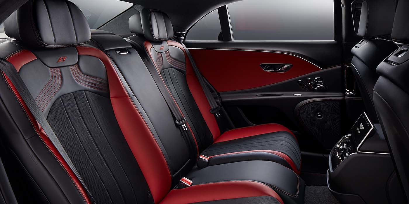 Bentley Kuala Lumpur Bentley Flying Spur S sedan rear interior in Beluga black and Hotspur red hide with S stitching
