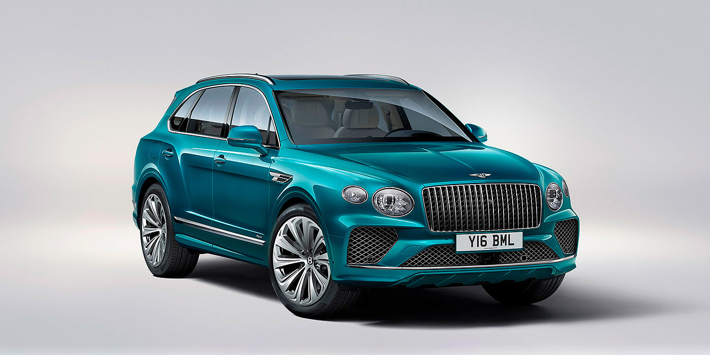 Bentley Kuala Lumpur Bentley Bentayga Azure front three-quarter view, featuring a fluted chrome grille with a matrix lower grille and chrome accents in Topaz blue paint.