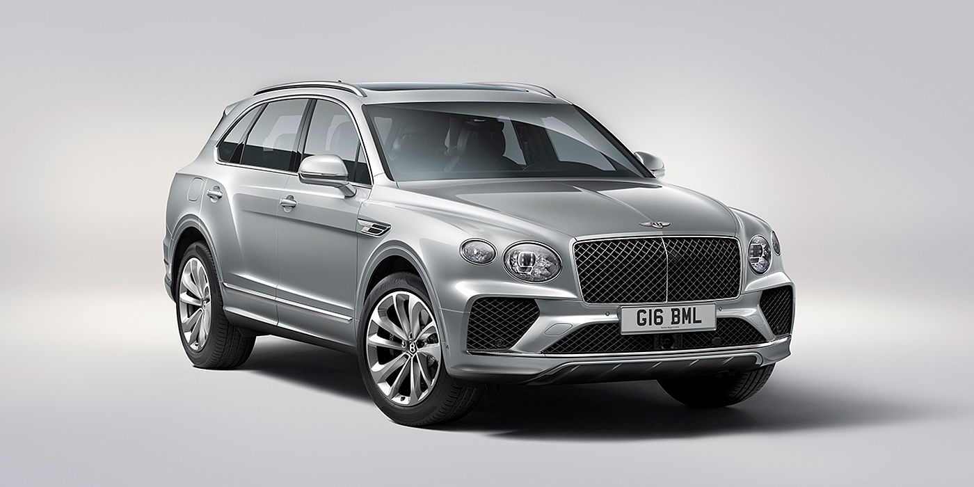 Bentley Kuala Lumpur Bentley Bentayga in Moonbeam paint, front three-quarter view, featuring a matrix grille and elliptical LED headlights.