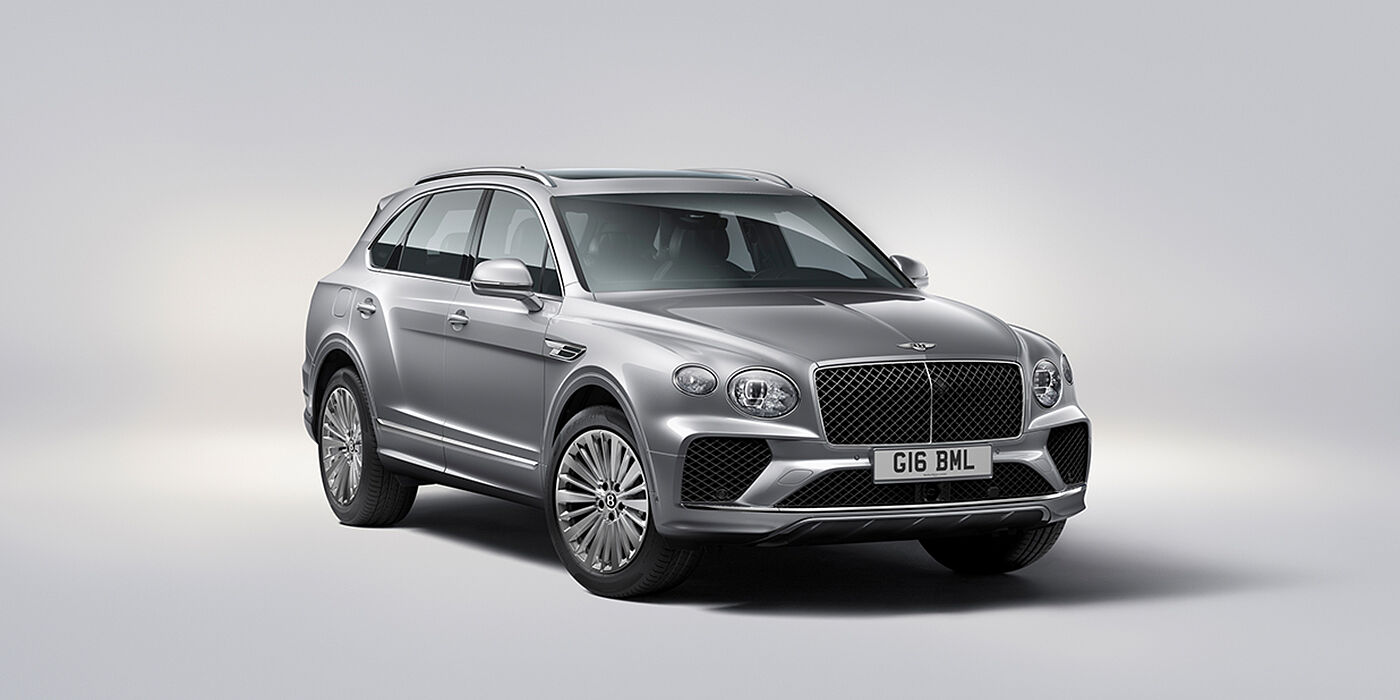 Bentley Kuala Lumpur Bentley Bentayga luxury SUV front three quarter view in Moonbeam paint with matrix grille and 21″ 5 spoke painted wheels