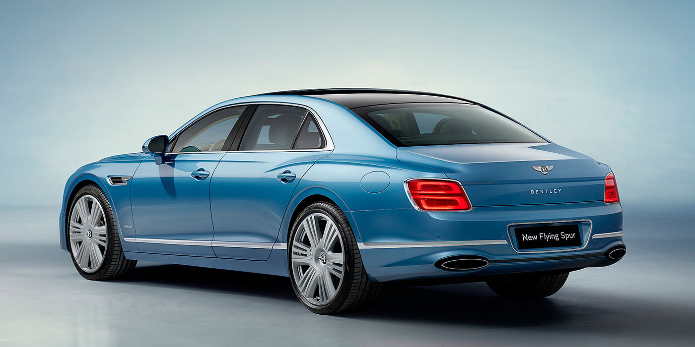 Bentley Kuala Lumpur New Bentley Flying Spur Azure sedan rear view in Light windsor blue by Mulliner paint with 22 inch Azure wheels and chrome exterior details