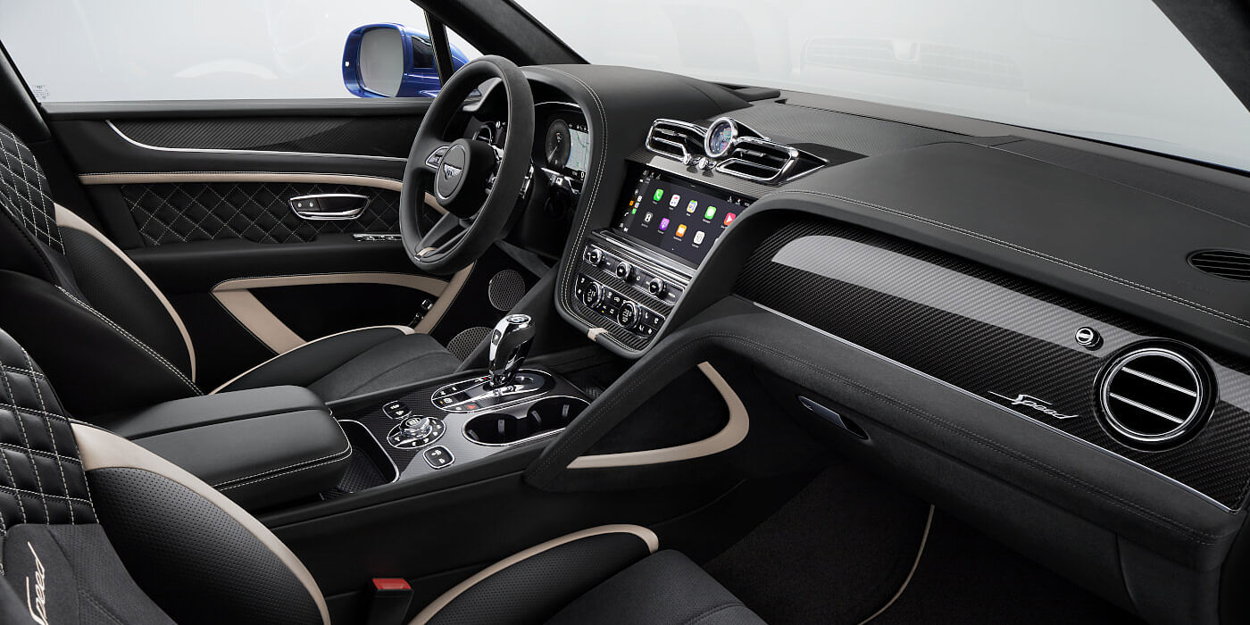 Bentley Kuala Lumpur Bentley Bentayga Speed SUV front interior in Beluga black and Linen hide with carbon fibre veneer
