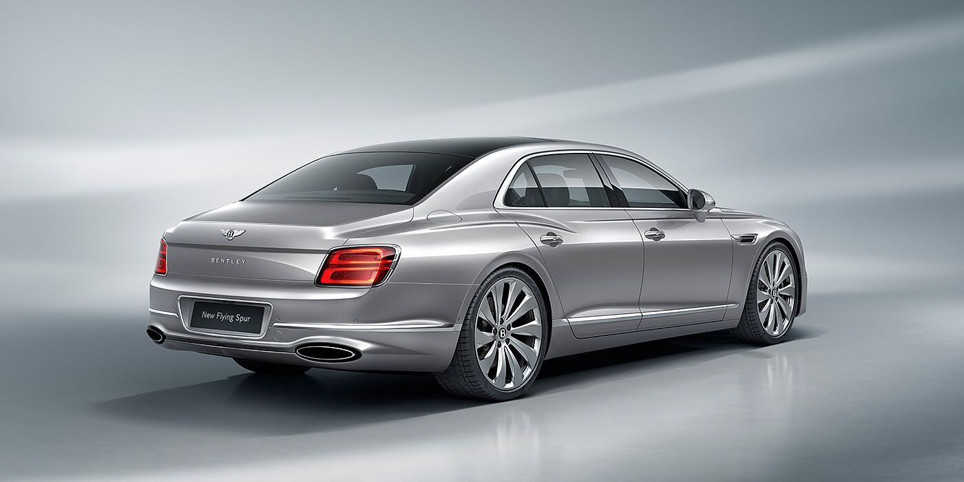 Bentley Kuala Lumpur New Bentley Flying Spur sedan rear view in Silverlake paint with ten spoke wheels and chrome matrix grille