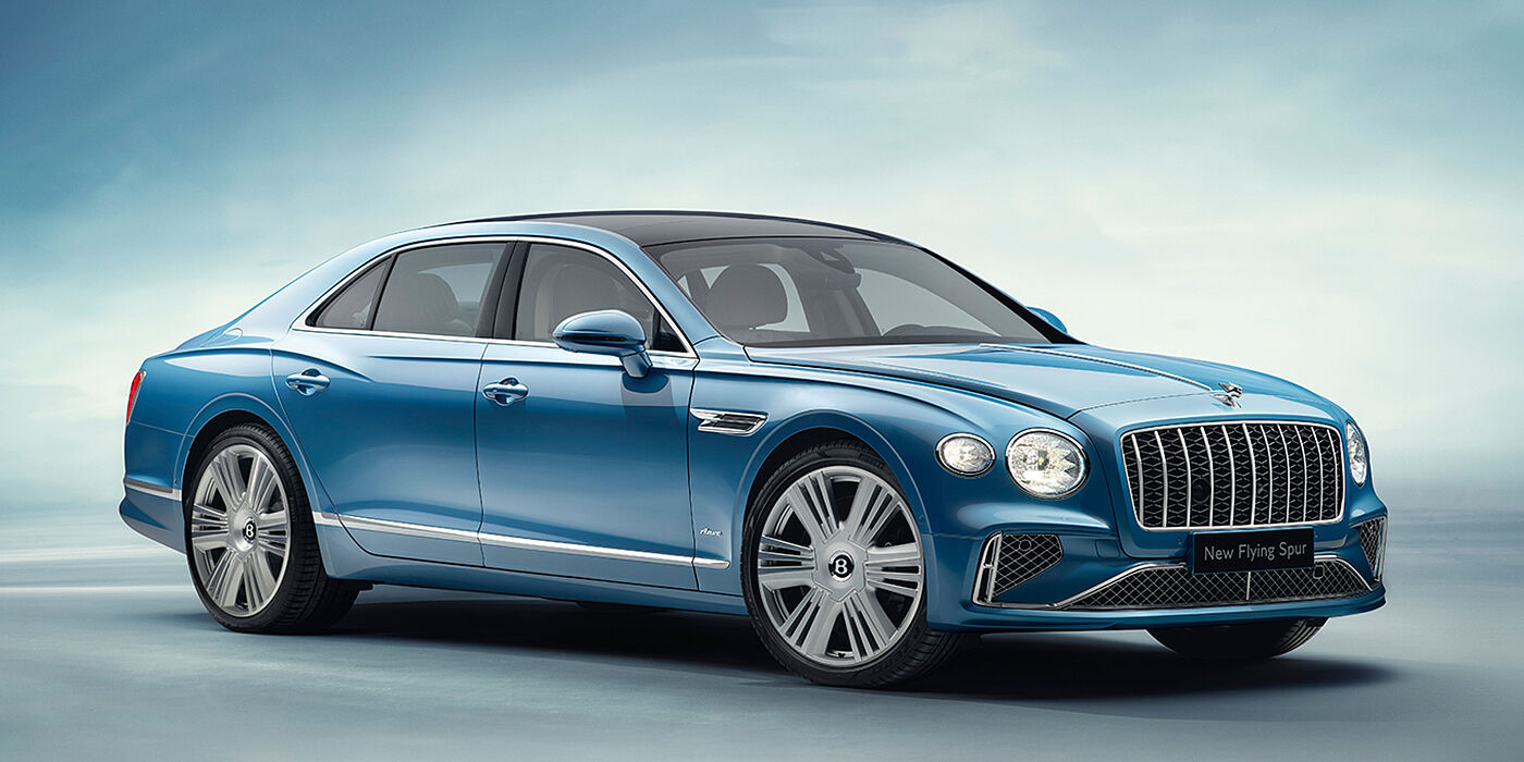 Bentley Kuala Lumpur New Bentley Flying Spur Azure sedan front view in Light windsor blue by Mulliner paint with 22 inch Azure wheels and chrome exterior details