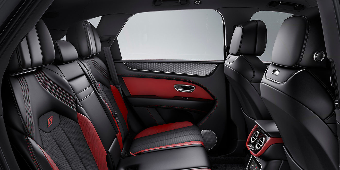 Bentley Kuala Lumpur Bentey Bentayga S interior view for rear passengers with Beluga black and Hotspur red coloured hide.