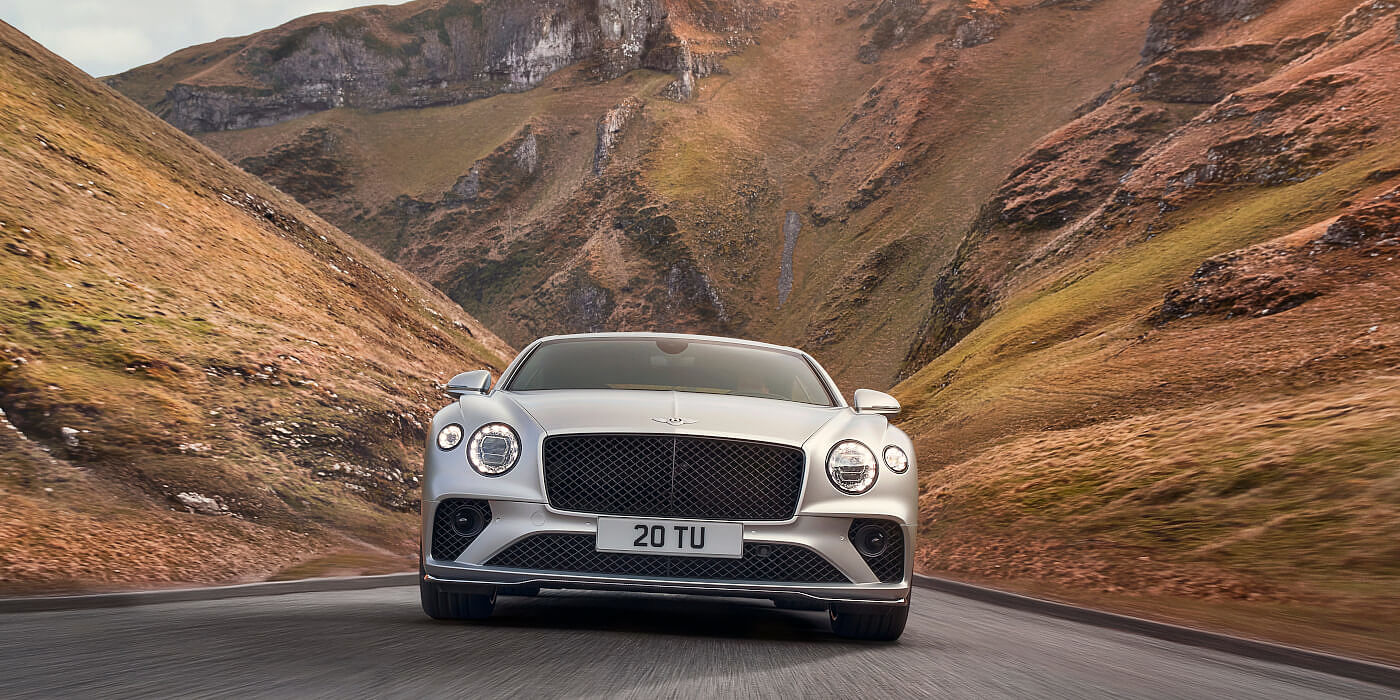 new-bentley-continental-gt-speed-in-satin-silver-by-mulliner-paint-front-view-peak-district