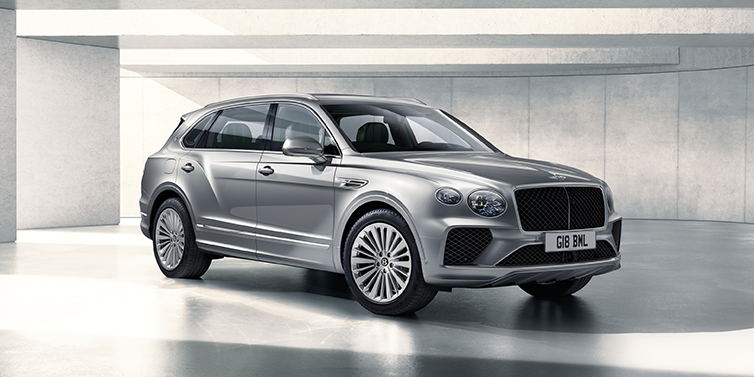 Bentley Kuala Lumpur Bentley Bentayga Extended Wheelbase SUV front three quarter in Moonbeam paint with a grey background