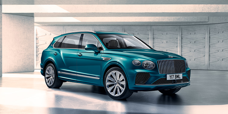 Bentley Kuala Lumpur Bentley Bentayga Extended Wheelbase Azure SUV front three quarter in Topaz blue paint colour with a grey background