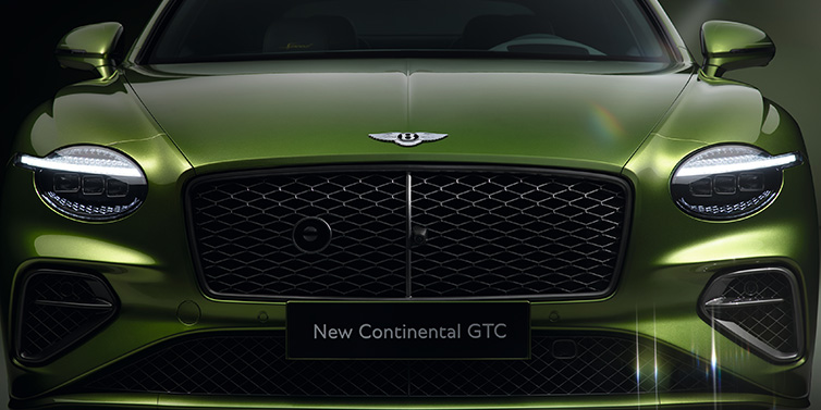 Bentley Kuala Lumpur Bentley Continental GTC Speed convertible front bonnet detail in Tourmaline Green paint showing new light design