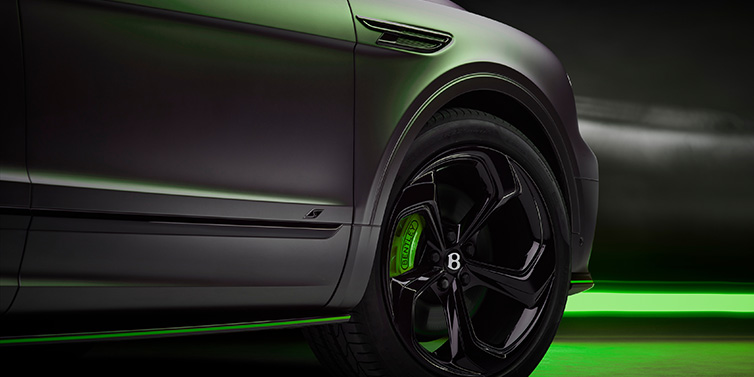 Bentley Kuala Lumpur Bentley Bentayga S Black Edition SUV exterior wheel detail with Cyber Green brakes with Anthracite Satin paint