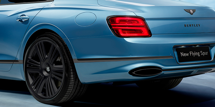 Bentley Kuala Lumpur New Bentley Flying Spur Azure sedan in Light windsor blue by Mulliner paint and Black Specification, showing 22 inch Black Azure wheel, black exhaust pipes and exterior features