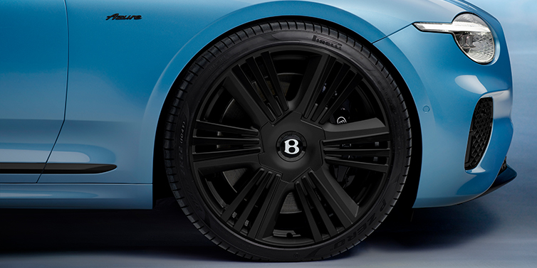 Bentley Kuala Lumpur New Bentley Continental GTC Azure convertible front wheel detail with 22 inch black ten spoke wheel and dark chrome details against Light Windsor blue paint