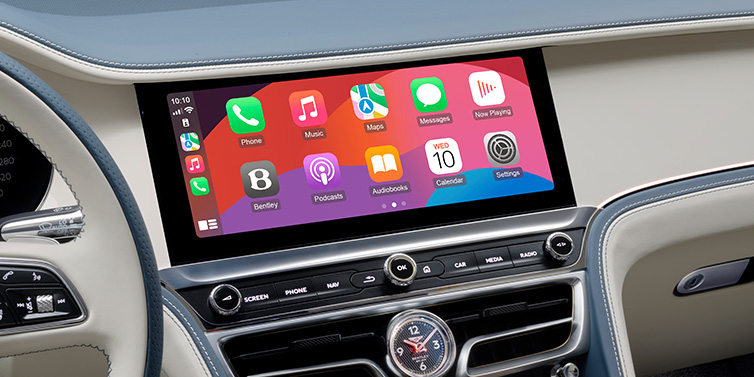Bentley Kuala Lumpur New Bentley Flying Spur Azure sedan front cabin central MMI screen showing available services against Linen and Brunel hides and Piano Linen veneer